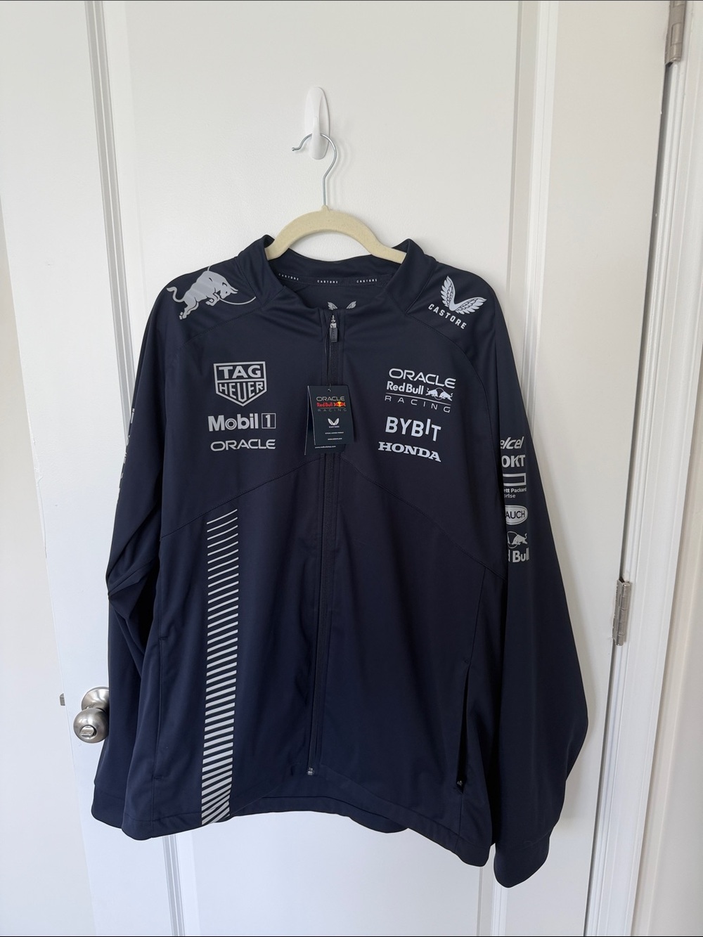 Castore Formula 1 Navy Lightweight Team Jacket with Sponsor Logos